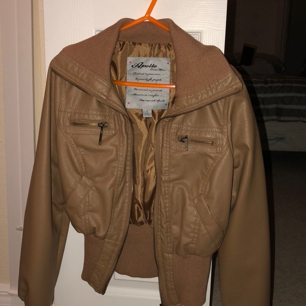 Brand new tan leather jacket never been worn!